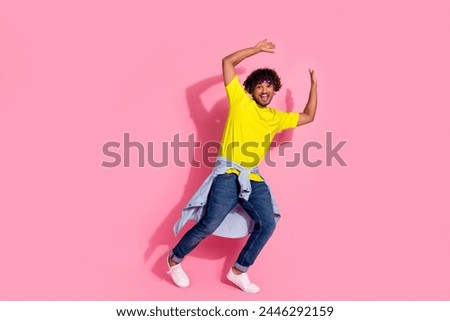 Photo of glad cheerful optimistic man wear stylish yellow clothes good mood isolated on pink color background