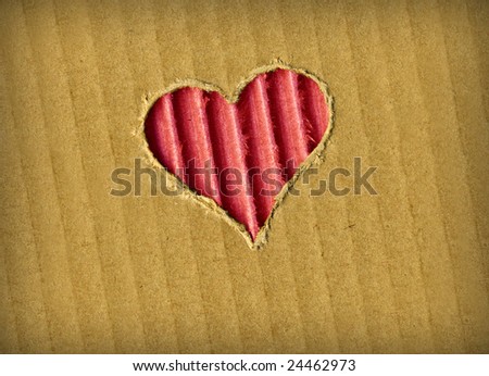 Grunge red heart on ragged cardboard. Nice Valentine background 03