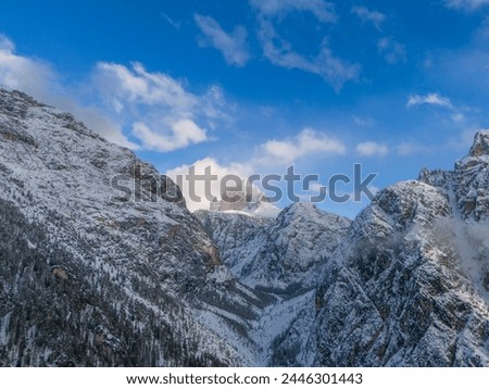 italian alps dolomites and surrounding characteristic mountains clouds fog castle church