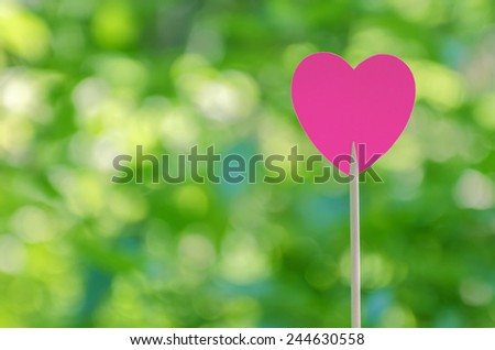 Pink heart with bokeh background
