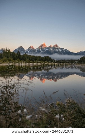 Grand Tetons, Wyoming, USA, Sunrise Landscape, Majestic Peaks, Teton Range, Rocky Mountains, Scenic Beauty, Outdoor Photography, Nature Photography, Golden Hour, Morning Glow, Spectacular View, River Royalty-Free Stock Photo #2446331971