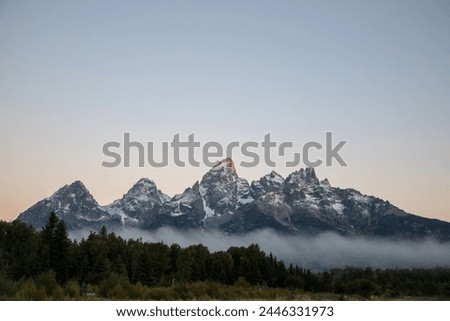 Grand Tetons, Wyoming, USA, Sunrise Landscape, Majestic Peaks, Teton Range, Rocky Mountains, Scenic Beauty, Outdoor Photography, Nature Photography, Golden Hour, Morning Glow, Spectacular View, River Royalty-Free Stock Photo #2446331973