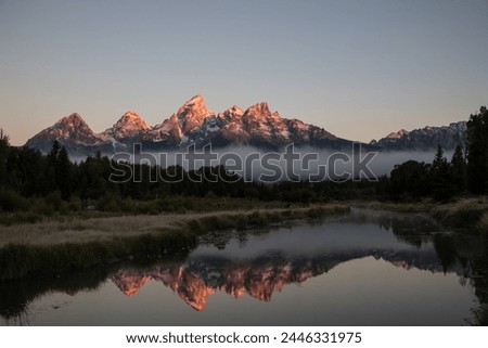 Grand Tetons, Wyoming, USA, Sunrise Landscape, Majestic Peaks, Teton Range, Rocky Mountains, Scenic Beauty, Outdoor Photography, Nature Photography, Golden Hour, Morning Glow, Spectacular View, River Royalty-Free Stock Photo #2446331975