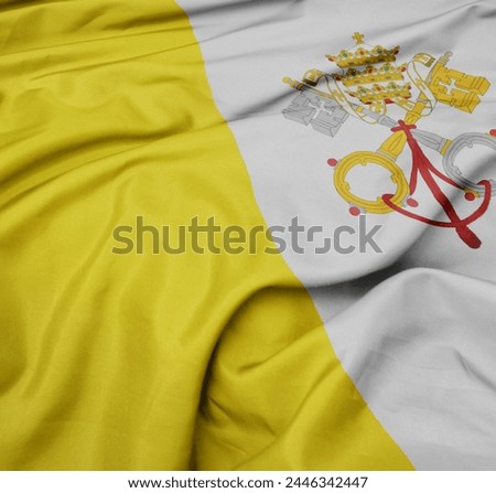 waving colorful national flag of vatican city. macro shot