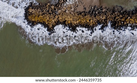 Aerial photography of the beach and breakwaters of Mar del Plata