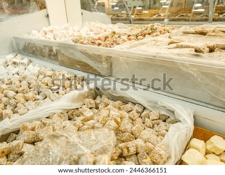 A variety of candy in a display case. Jelly sugar candies. Colorful Sweets on a market, candy shop. Turkish delight lokum
 Royalty-Free Stock Photo #2446366151