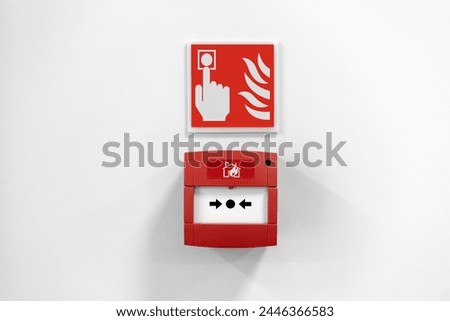 Fire alarm button in the building, Red fire alarm button on wall. Emergency button in red box to use in case of fire.
 Royalty-Free Stock Photo #2446366583