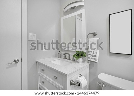 Modern Bathroom Stone Vanity with White Frame Mirror and Empty Photo Frame Mockup, Wash Your Hands Towel