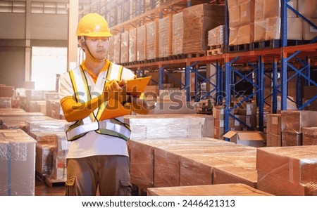 Warehouse Worker Holds a Clipboard and Checks Stock. Package Boxes. Supply Chain. Shipment Goods Delivery to Customers. Storage Warehouse. Inventory Management Supplies. Shipping Warehouse Logistics.