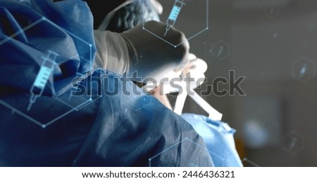 Image of network of medical icons and data processing over african american female surgeon. Global science, medicine, research, computing and data processing concept digitally generated image.