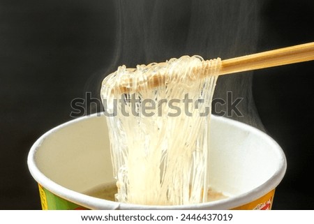 Vermicelli soup on black background