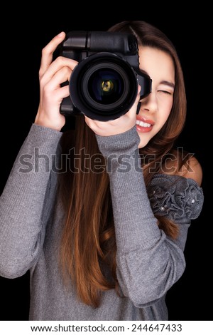 young woman with a digital slr camera