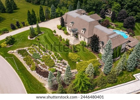 Capture the essence of outdoor serenity with these captivating house landscaping photos. Explore the beauty of meticulously designed gardens and backyards, perfect for enhancing. Luxury and Modern