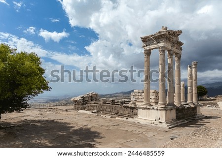 Ruined Temple of Trajan in Pergamon Ancient City. CIconic archeological site, masterpiece of Roman imperial architecture. Scenic sky at background. Bergama (Izmir), Turkey (Turkiye)
