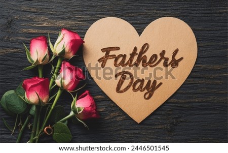 Heart shaped fathers day card with roses on wood background