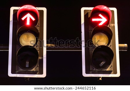 Red traffic lights on night background