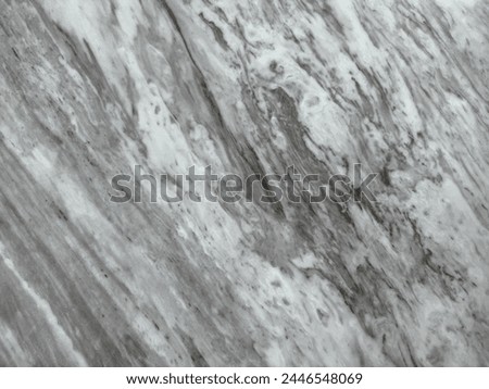 Natural and luxurious white marble with dark grey veinings, White carrara natural marble from Italy. Seamless texture.