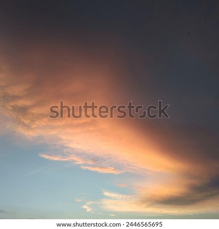 The picture is a evening sky. Sun rises fall in to clouds because  orange colour.  It is beautiful  seen.