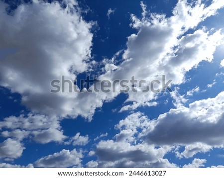 photo of blue sky covered with clouds.
