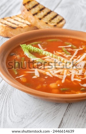 Portion of Minestrone soup made with vegetables and stock