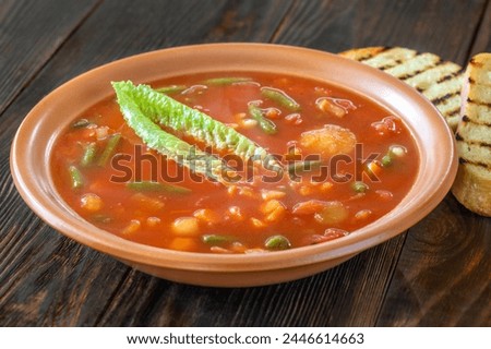 Portion of Minestrone soup made with vegetables and stock