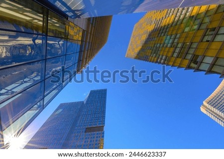 Sunlit Cityscape: Captivating 4K Ultra HD Picture of Modern Buildings and Skyscrapers