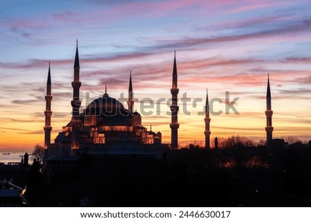 The Blue Mosque (Sultanahmet Camii) with illumination against the sunset. Famous islamic monument of the Ottoman architecture in Istanbul, Turkey.