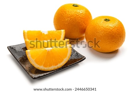 Japanese citrus hassaku on white background Royalty-Free Stock Photo #2446650341