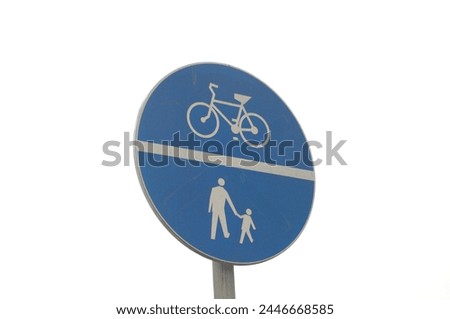 Road sign for bike road and walkroad. Blue sign over white backgroud Royalty-Free Stock Photo #2446668585