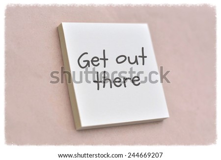 Text get out there on the short note texture background