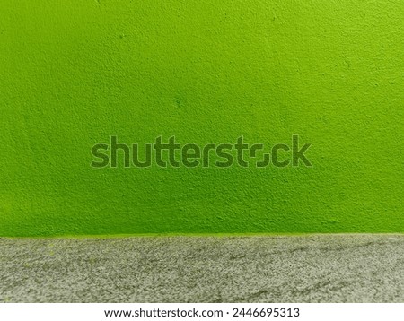 Green wall with floor surface texture background 