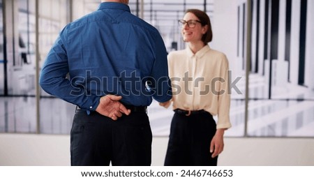 Liar With Crossed Finger. Business Contract Handshake And Deceit Royalty-Free Stock Photo #2446746653
