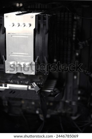 Inside the computer case. Processor radiator and RAM.
