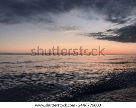 Picturesque view of evening seascape after sunset.