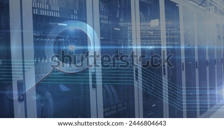 Image of a magnifying glass icons over an empty server room. digital interface global connections concept digitally generated image.