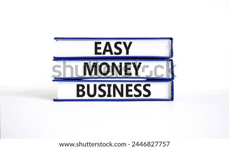 Easy money business symbol. Concept words Easy money business on beautiful books. Beautiful white table white background. Easy money business concept. Copy space.
