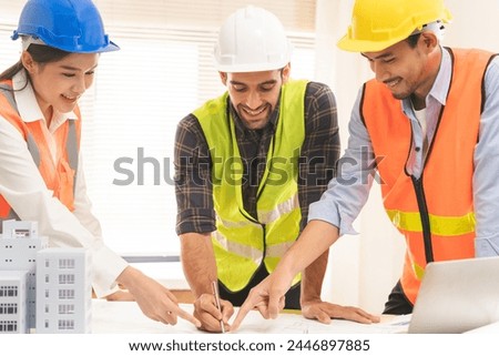Construction of Engineer, architect businessman, woman making on blueprint house building in office together, meeting plan working with partner team colleagues with 3D model, discussing design project