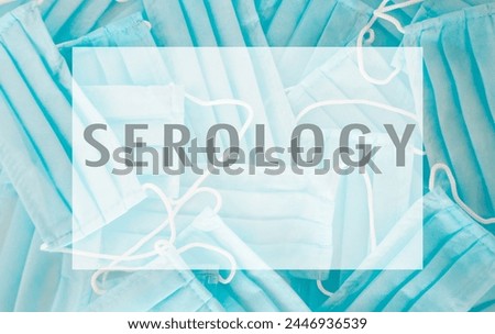 A blue sign with a bunch of masks on it that says Serology. Concept of medical importance and the idea of testing for diseases Royalty-Free Stock Photo #2446936539