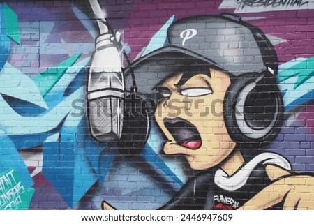 The wall art or graffiti is very artistic. Royalty-Free Stock Photo #2446947609
