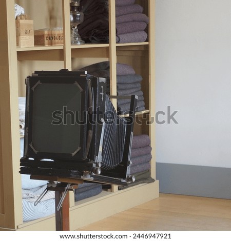 An antique camera from the 19th century. Royalty-Free Stock Photo #2446947921
