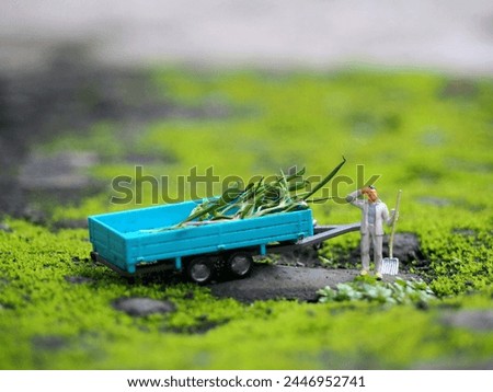 Mini toy of action figure at outdoor with blurred background. Toy photography concept design.
