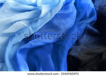 Airy dark blue silk fabric. Cobalt curtain tissue texture, folded dress textile background. Marine ocean sea waves, gradient chiffon clothing, indigo 3d abstract water, sky
