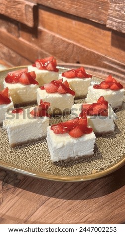 Cheesecake slices with strawberry topping