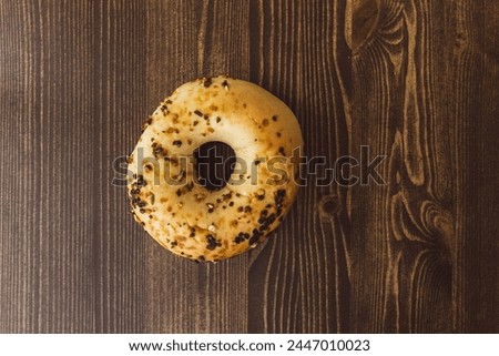 Delicious bagels on a wooden table