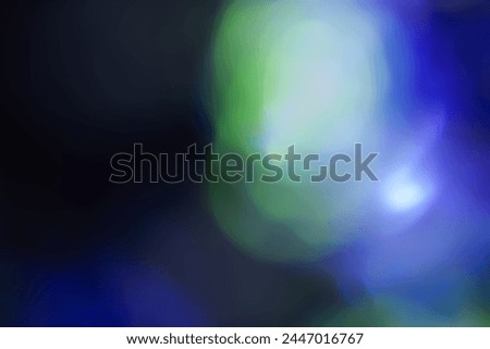 Defocused neon light. Overlay of light highlights. Futuristic LED lighting. Blur of neon colors on dark abstract background