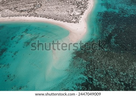 Aerial picture from a scenic flight over the Ningaloo reef in Exmouth, Australia. Beautiful aerial view of Turquoise bay beach, beautiful lagoon in the cape range national park. Breathtaking view.