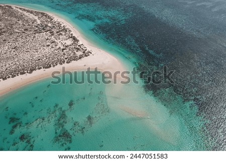 Aerial picture from a scenic flight over the Ningaloo reef in Exmouth, Australia. Beautiful aerial view of Turquoise bay beach, beautiful lagoon in the cape range national park. Beautiful ocean view.