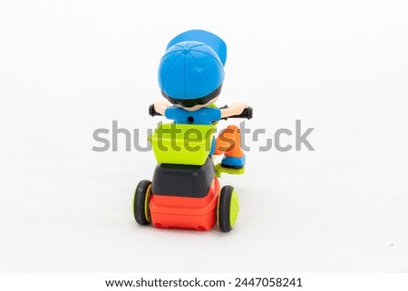 Small cartoon riding tricycle with delivery box on white isolated background