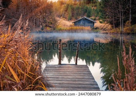 Calm morning scene of Wagenbruchsee lake. Wonderful autumn view of Bavarian Alps, Germany, Europe. Beauty of nature concept background. Royalty-Free Stock Photo #2447080879