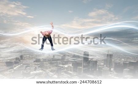 Young guy in casual evading from light rays